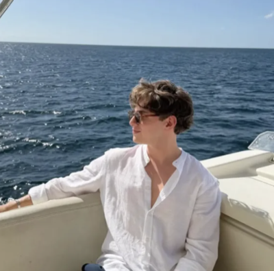 Community member seated on a boat